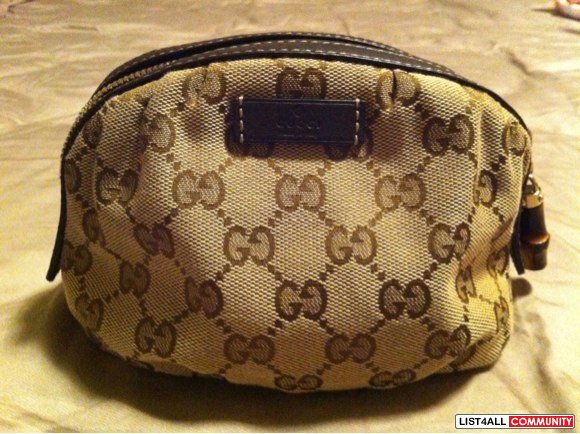 authentic gucci pouch