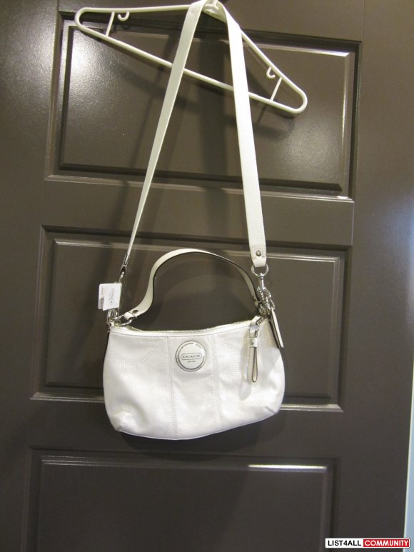 white coach purse with rainbow strap